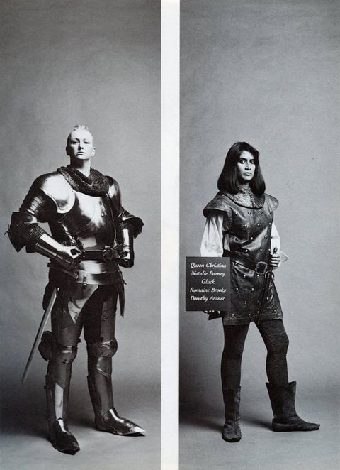 Two black and white photographs. Man with light hair standing in suit of gleaming armour with sword, hands resting at 45-degree angles on his waist. Right photograph showing South Asian woman dressed in loose studded leather tunic with billowing sleeves and belt, she holds a dagger and board with names listed, her left boot is turned out.