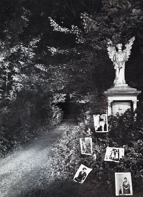 Black and white photograph. Road winds across a woodland area at night with a carved, slightly aged marble statue of a winged angel on the right side. Five photographs nestled in foliage showing various people.